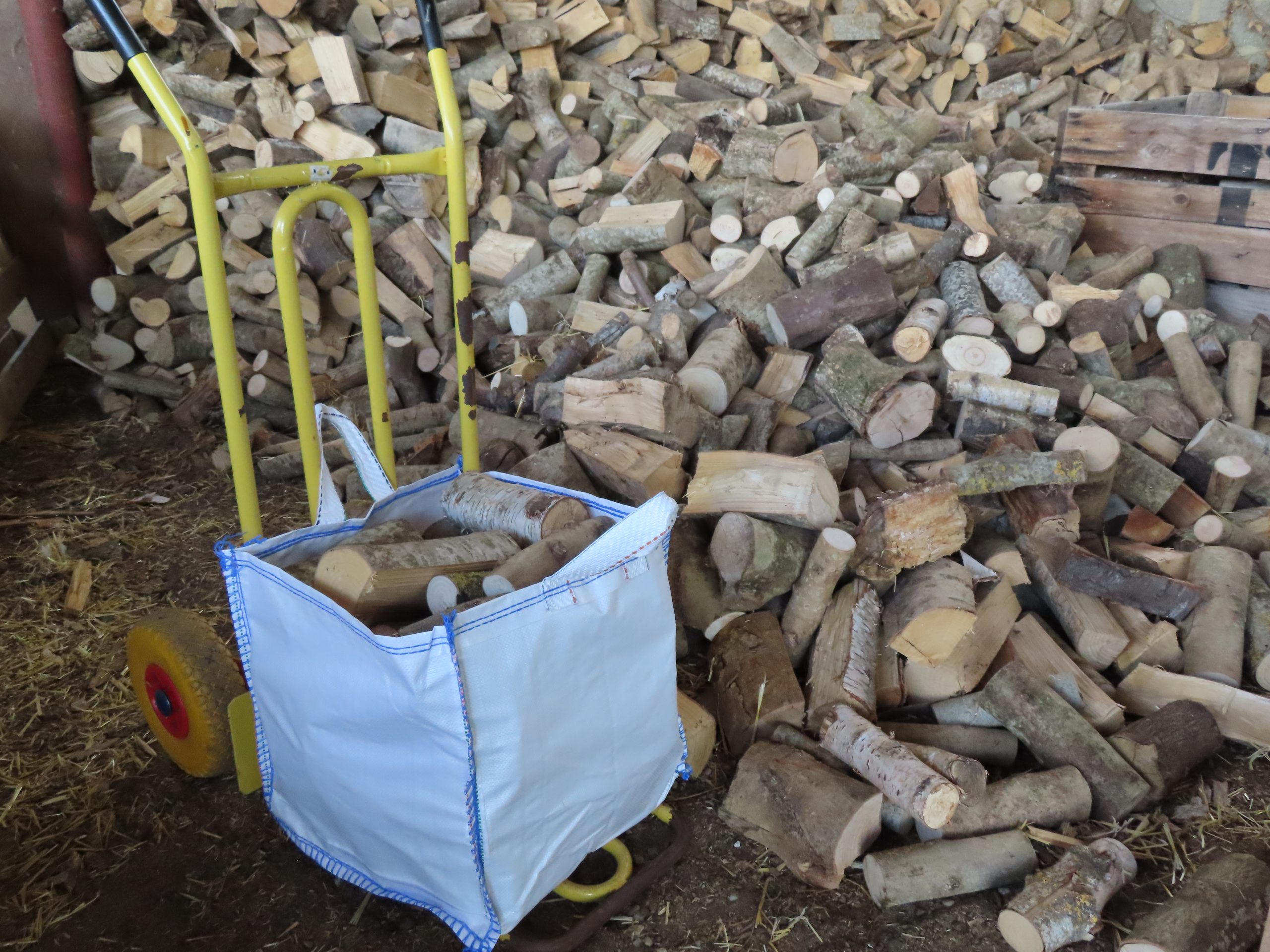 Logs with sack barrow